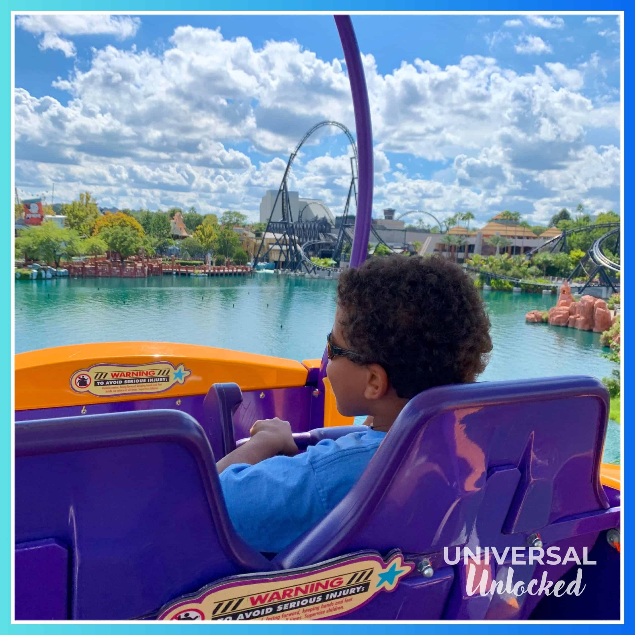 An Unlocked child enjoying the views on The High in the Sky Seuss Trolley Train Ride!™ in Seuss Landing at Islands of Adventure