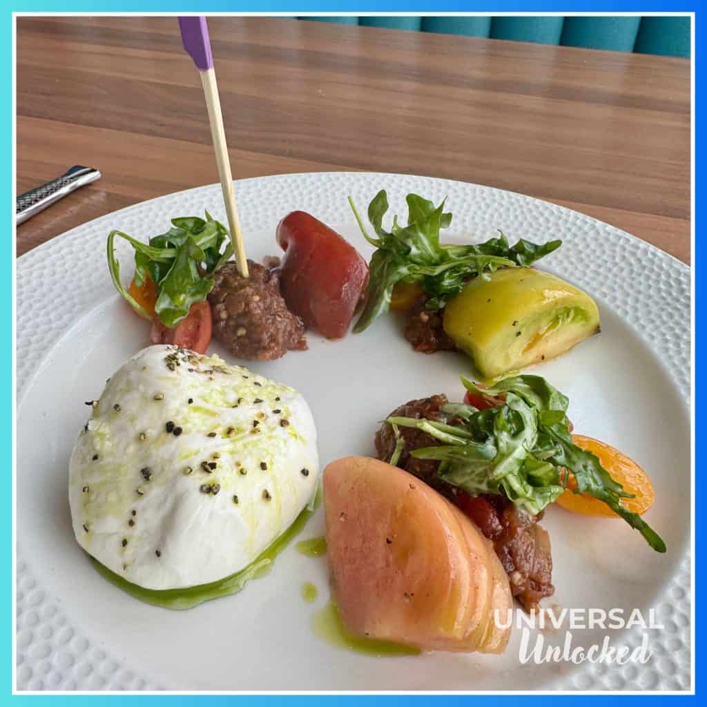 Gluten Free Tomato and Burrata Salad at Atlantic restaurant at EPIC Universe