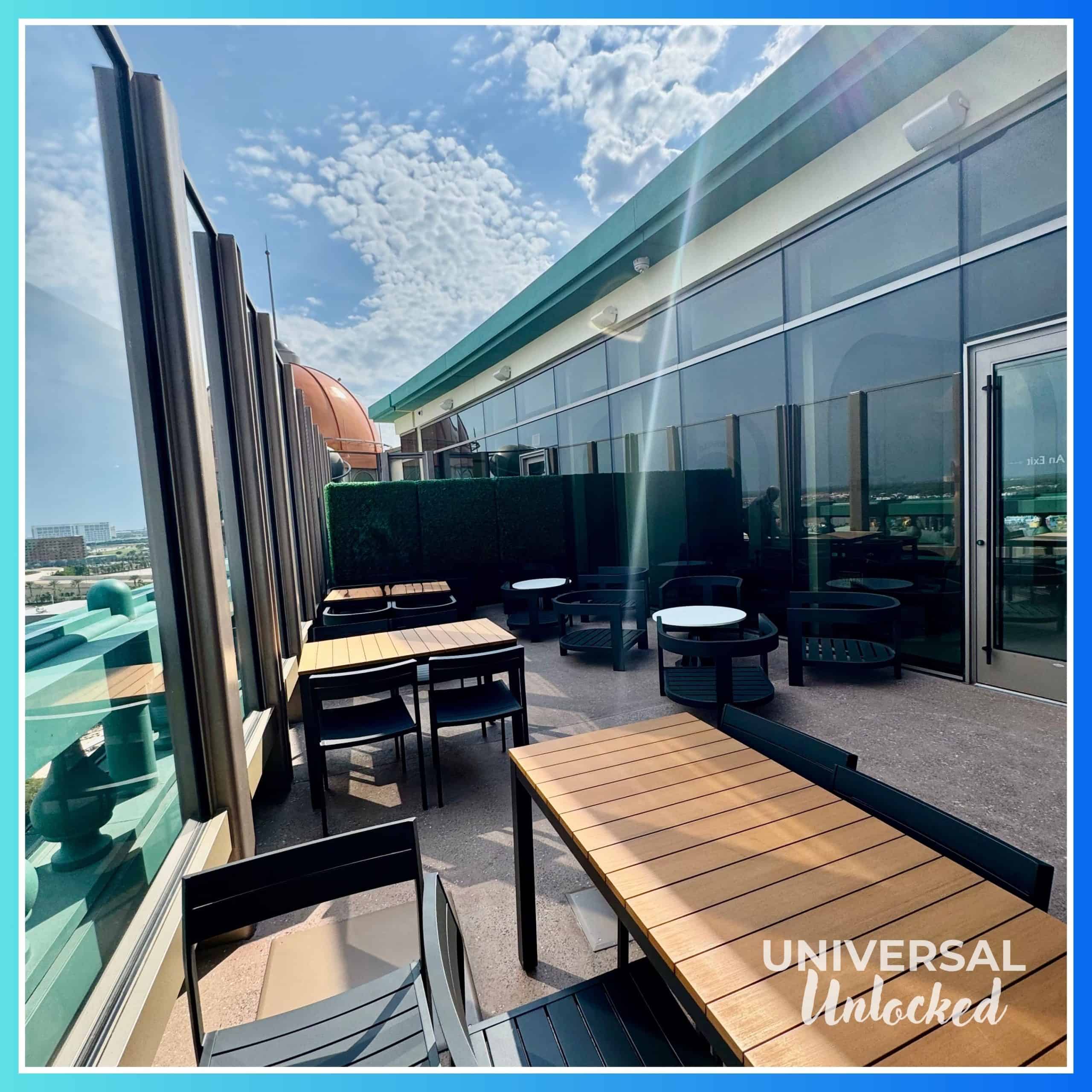 Outside patio at Bar Helios at the Helios Grand Hotel for Universal Unlocked's gluten free guide to epic universe hotels