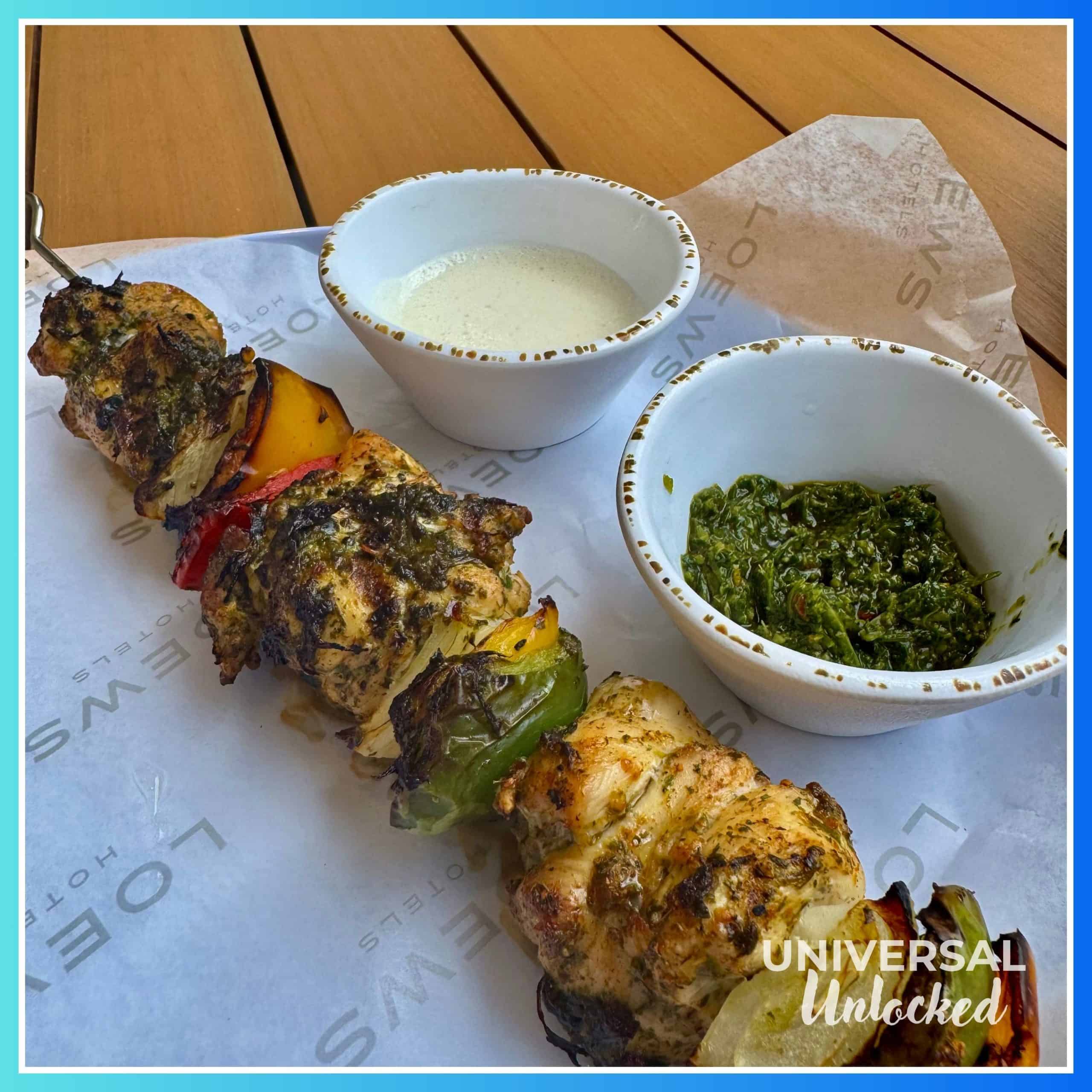 Chicken skewer at the Lotus Lagoon pool and bar at the Helios Grand Hotel