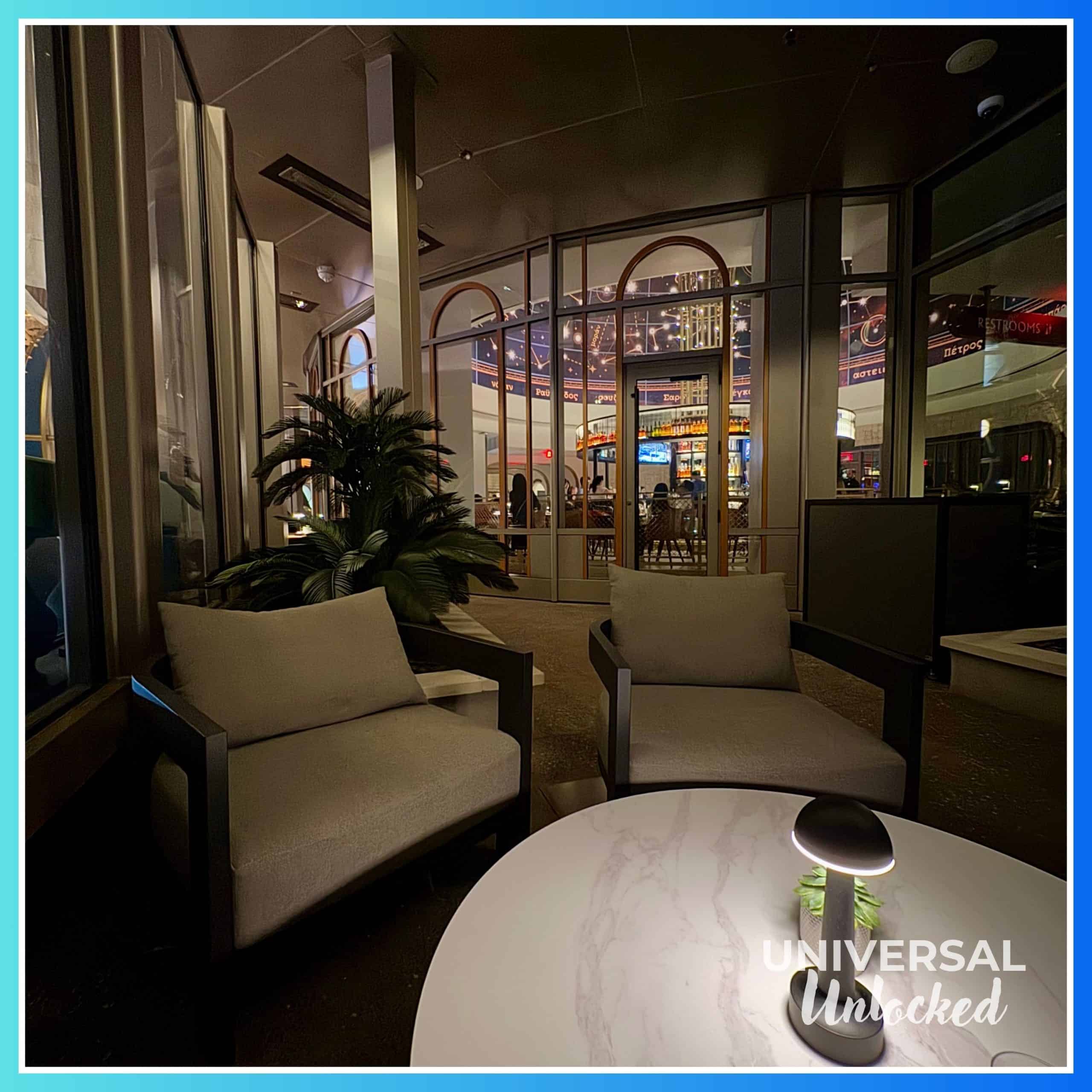 Patio seating at Bar Helios at the Helios Grand Hotel