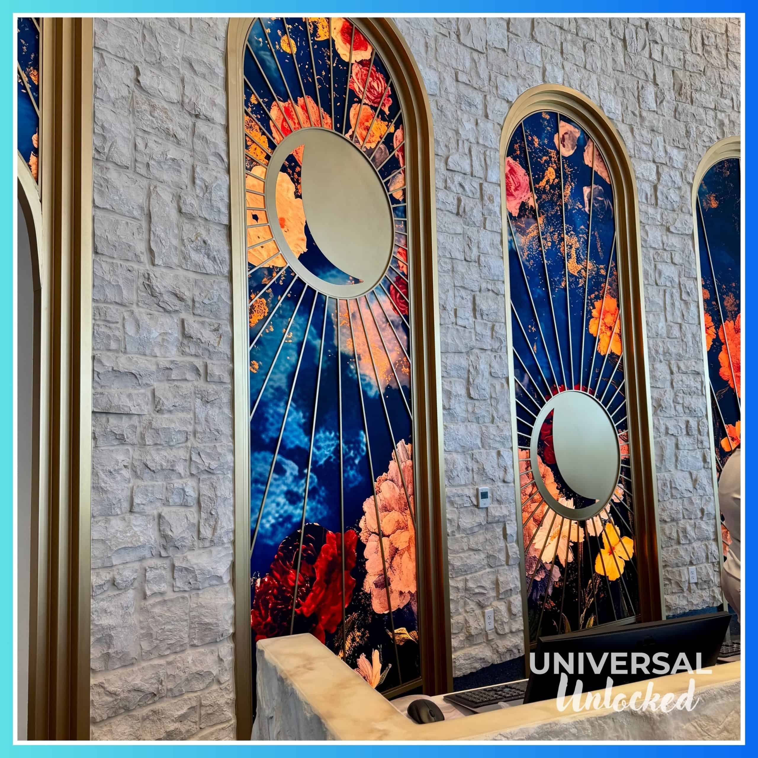 Light murals in the main lobby of the Helios Grand Hotel