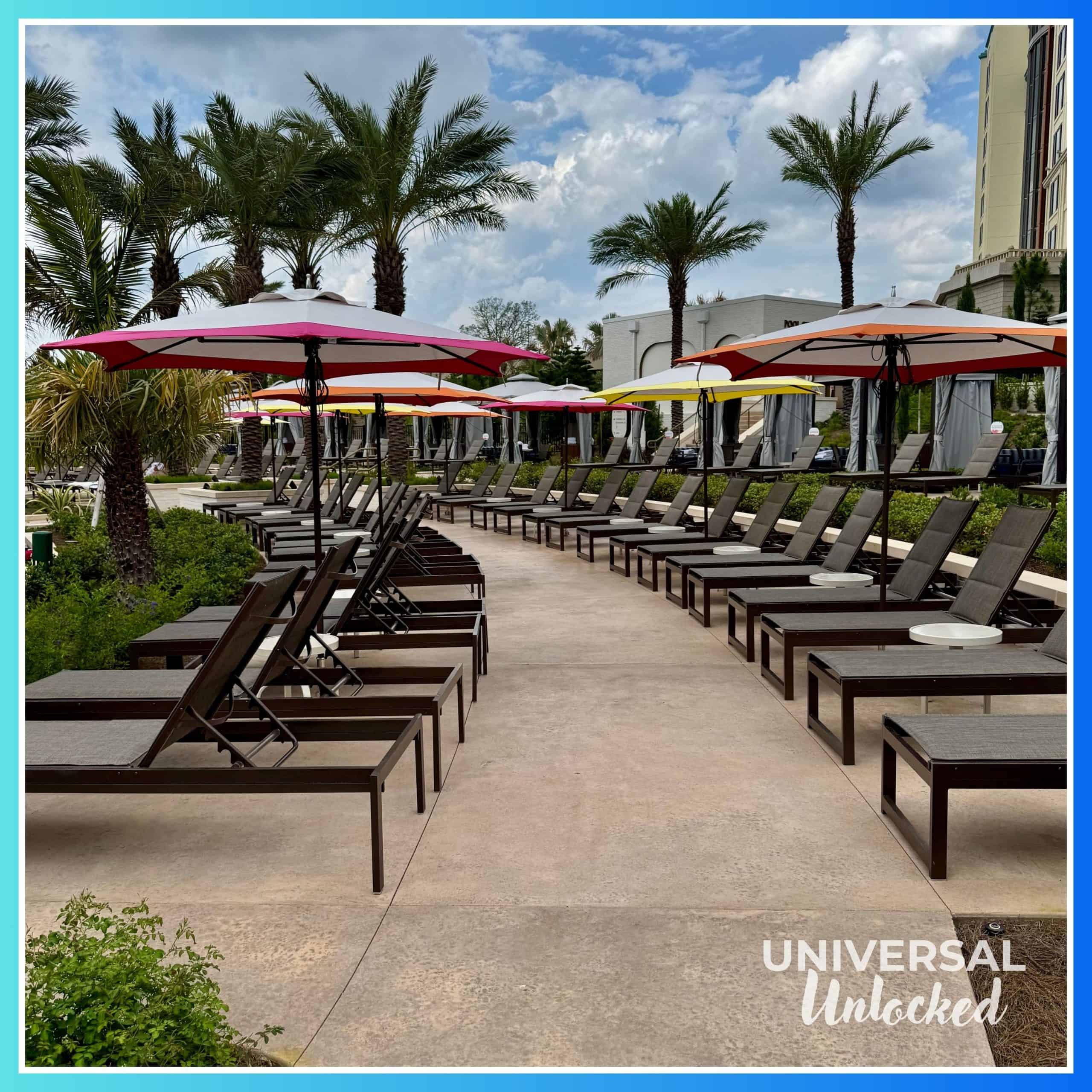 Seating at the Helios Grand Hotel pool