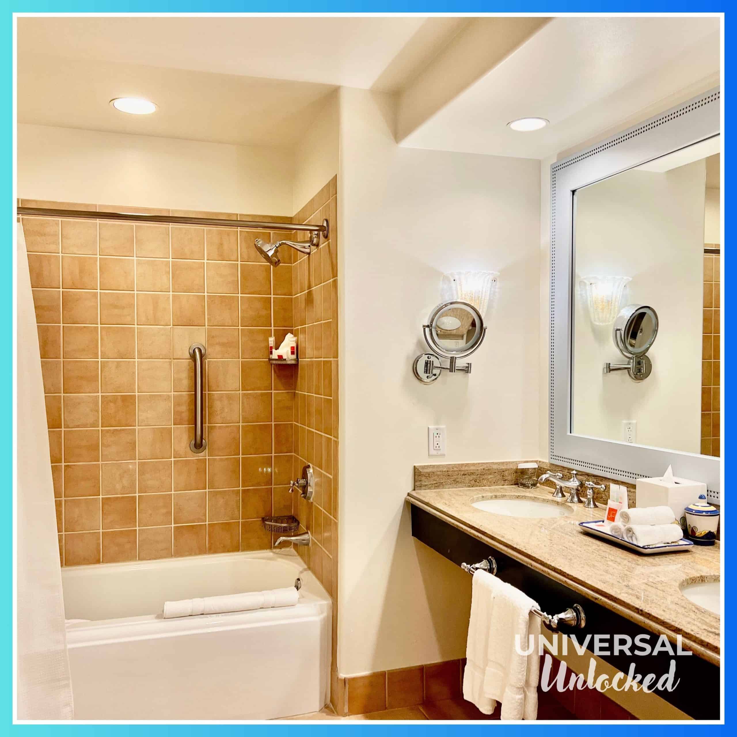 Inside a standard room bathroom at Portofino Bay Hotel