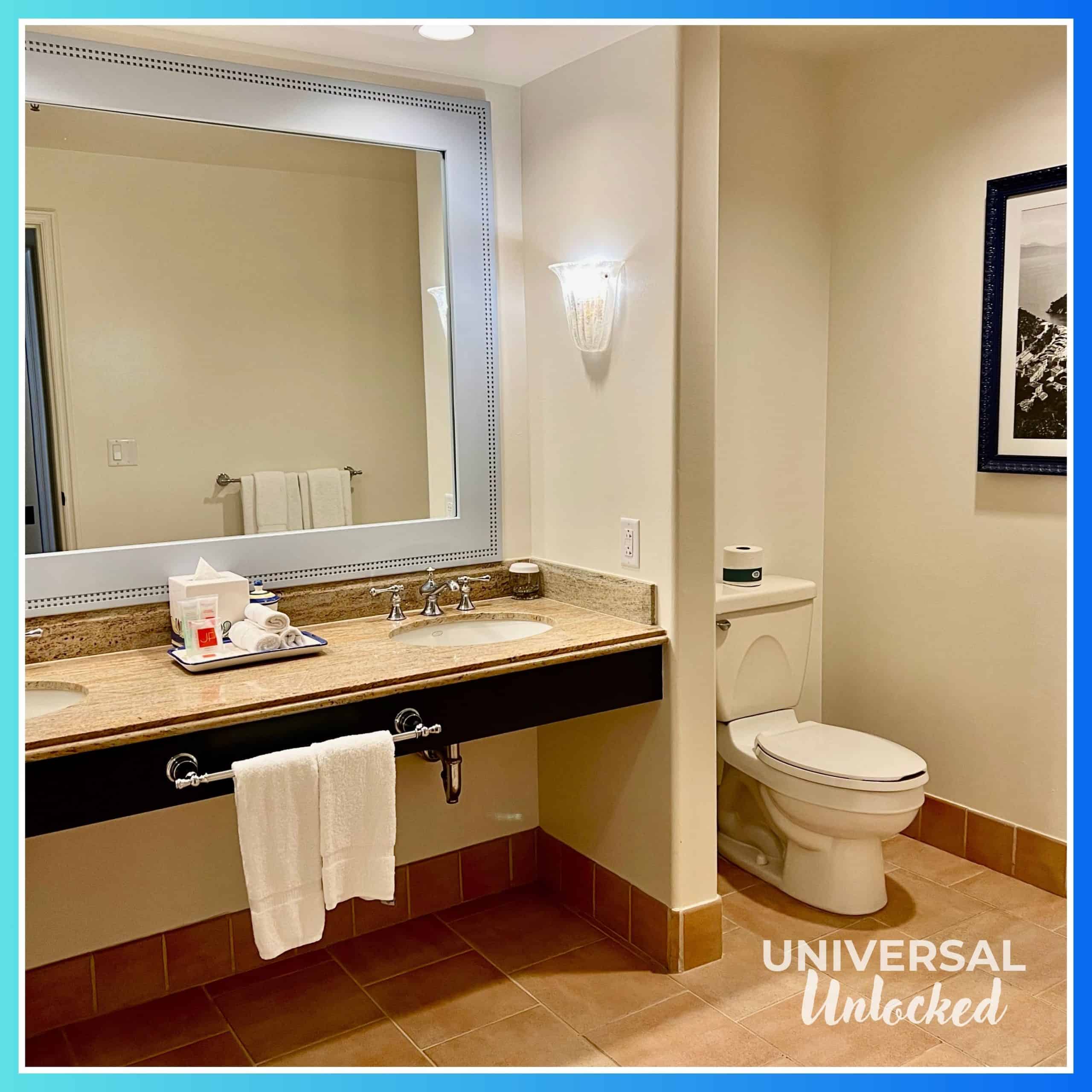 Inside a standard room bathroom at Portofino Bay Hotel