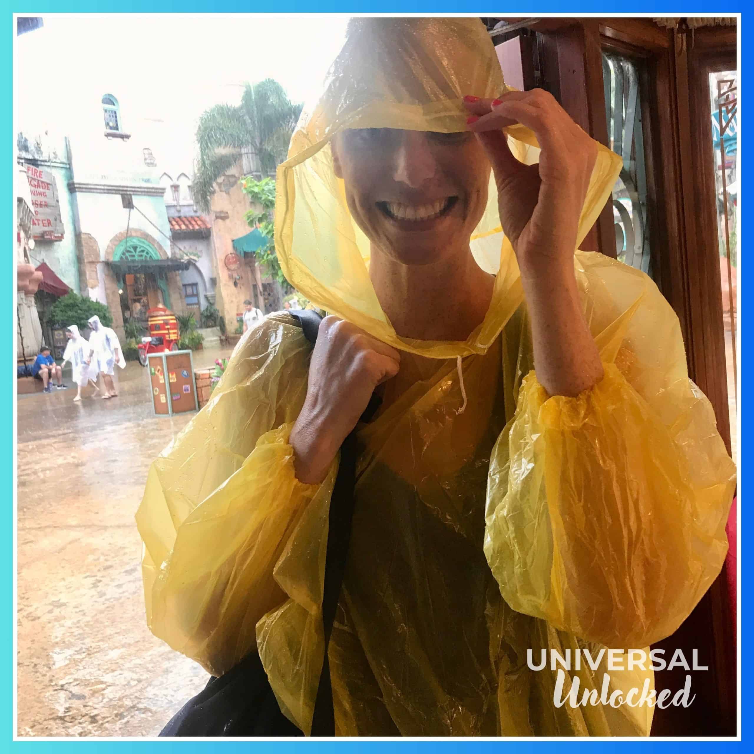 Laney in the rain in the Port of Entry area of Islands of Adventure