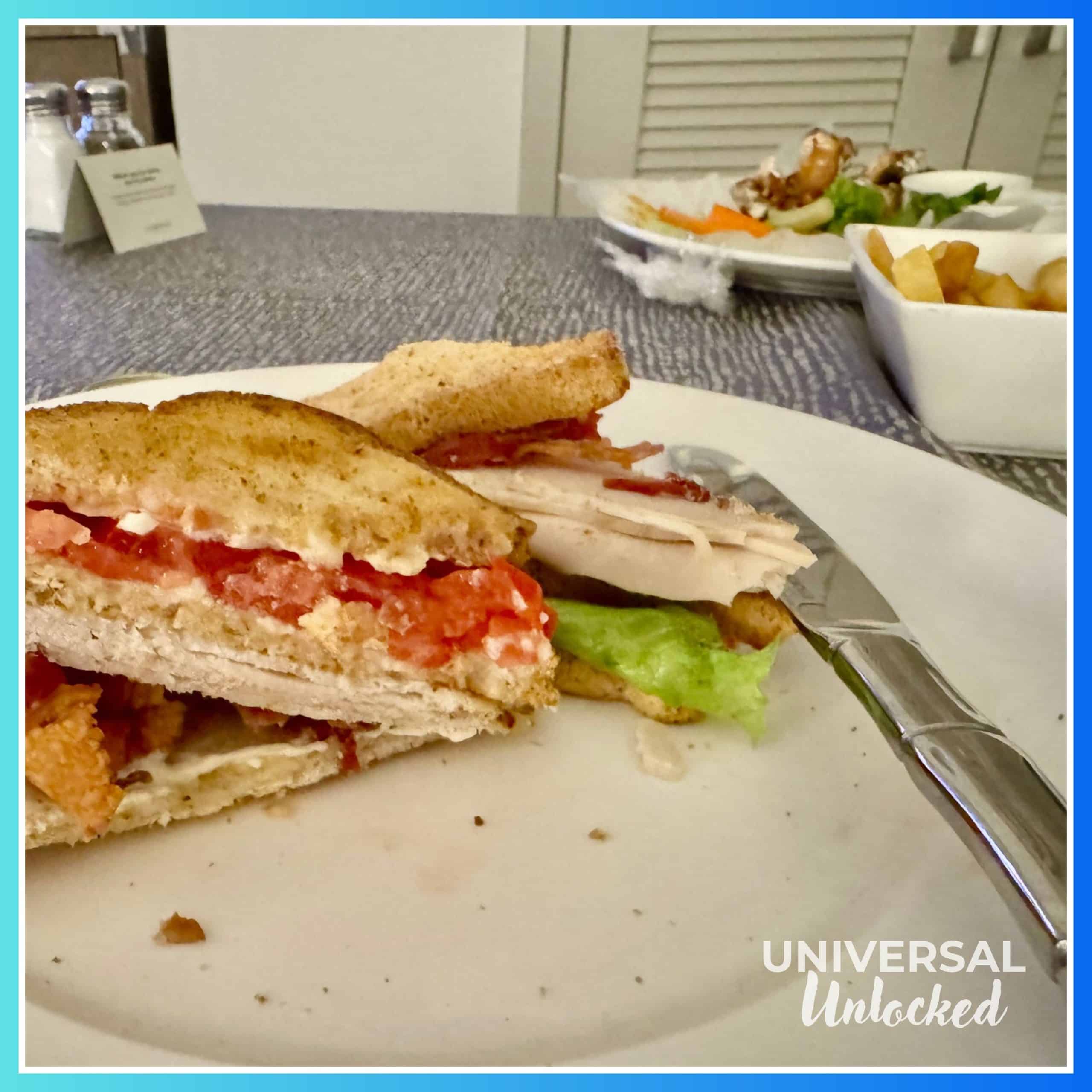 Gluten free club sandwich and fries from 24/7 room service at Royal Pacific Resort