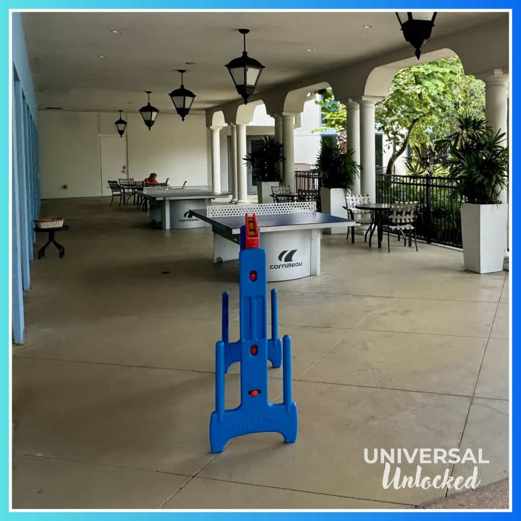 Outdoor games in the pool area at Sapphire Falls Resort