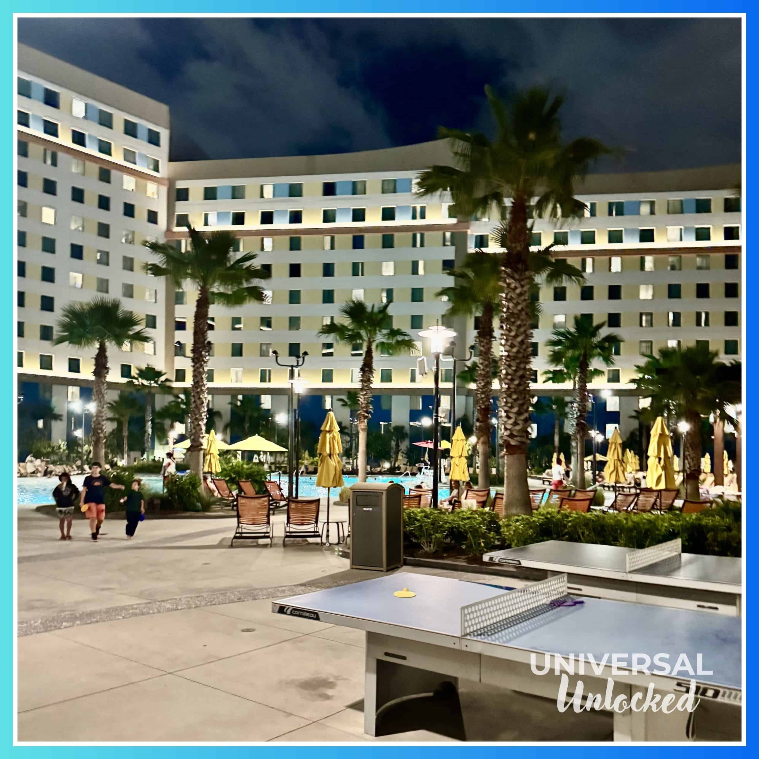 Night views of the pool area at Dockside Inn and Suites