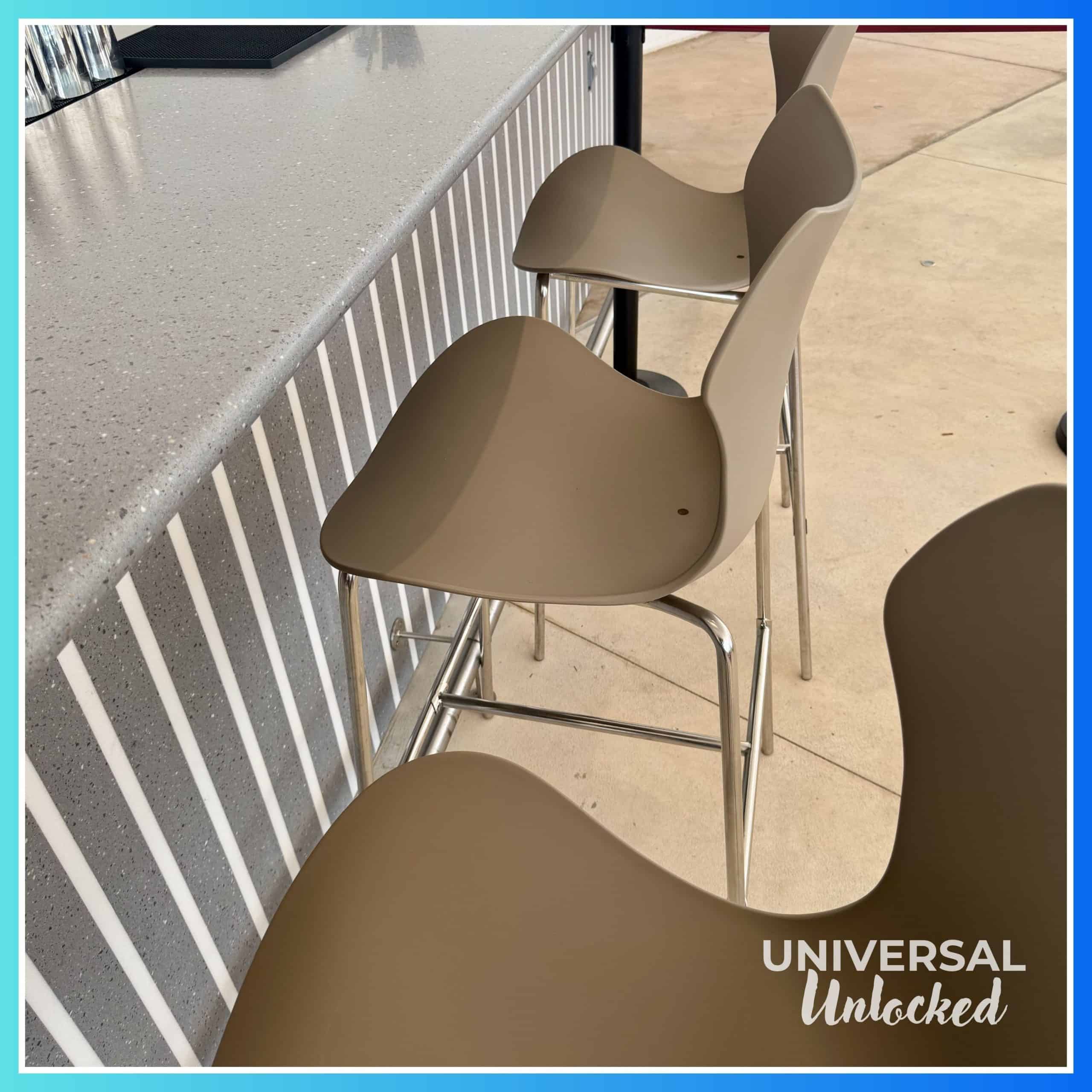 Bar stools at the Moonrise Bar in the pool area of Terra Luna Resort