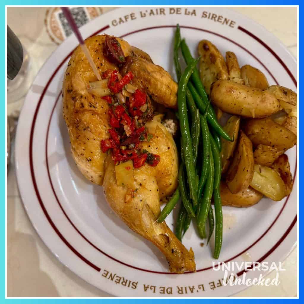 Half Chicken, potatoes, and Green Beans at Café L’air De La Sirène™ in the Wizarding World of Harry Potter - Ministry of Magic at EPIC Universe