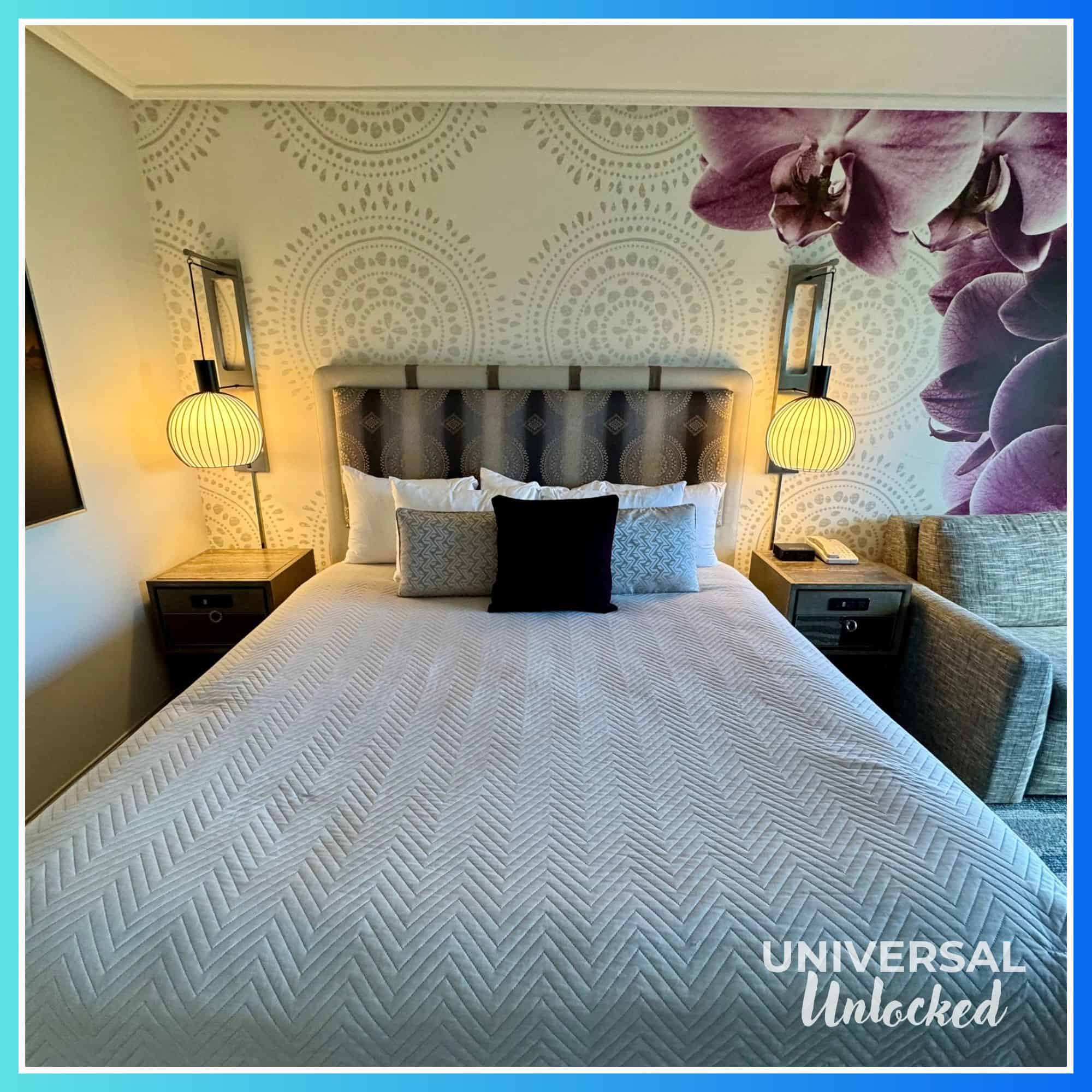 Bed in a standard guest room at Royal Pacific Resort