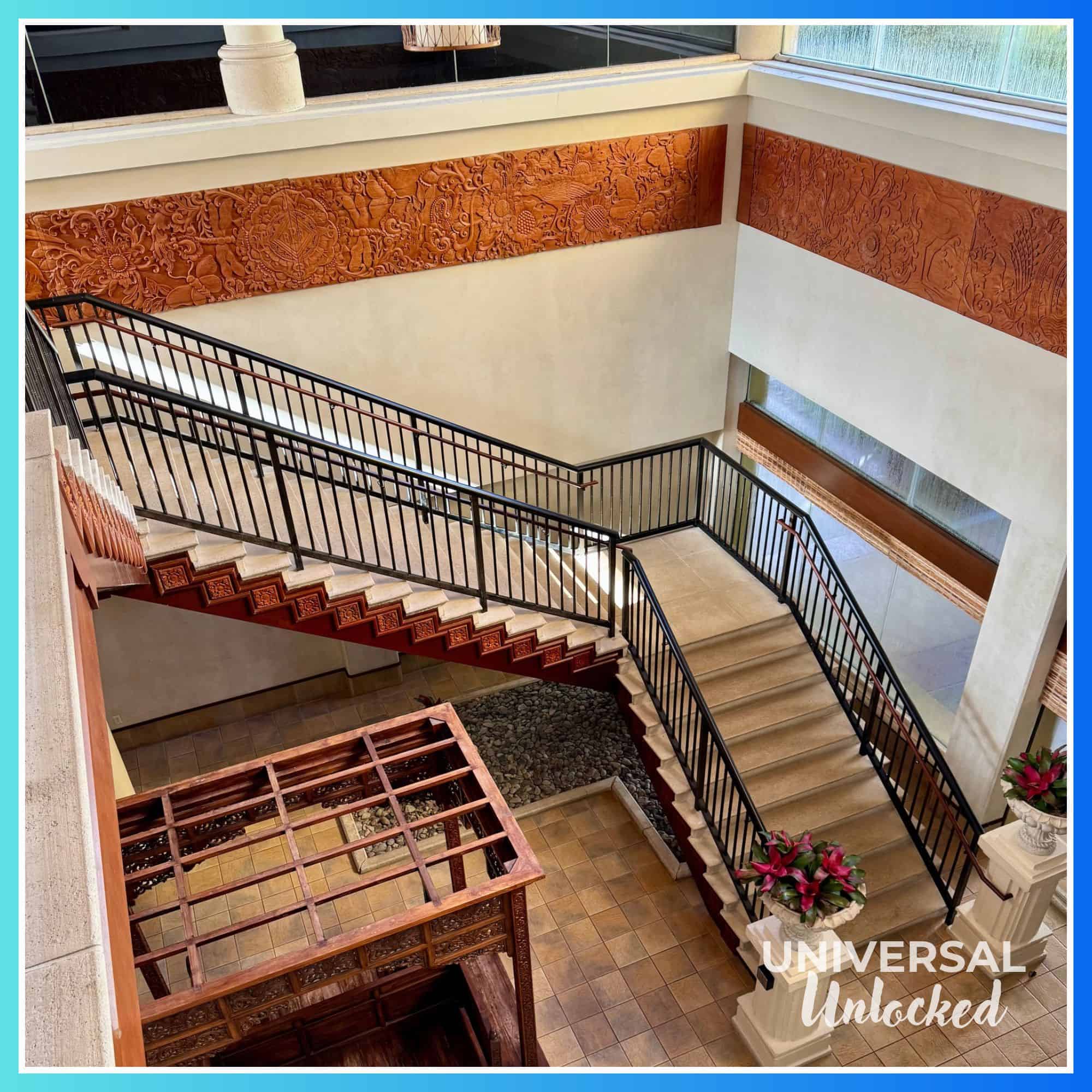 Stairs from the main lobby down to the main restaurant area at Royal Pacific Resort